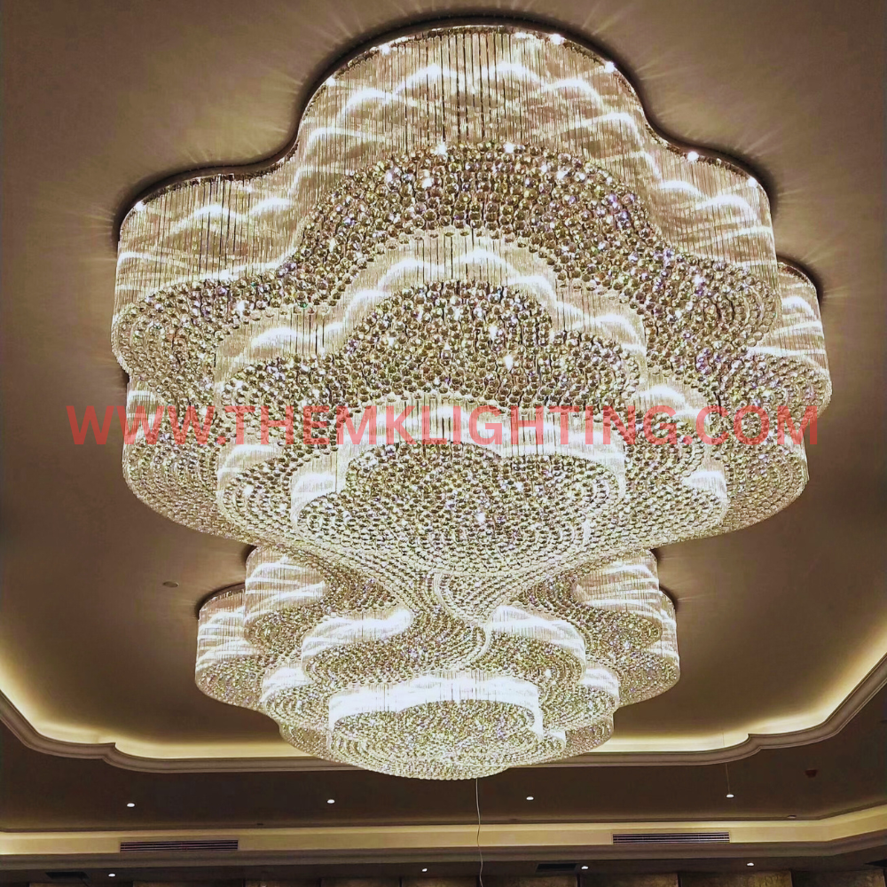 Designer crystal chandelier installed in hotel lobby by MK Lighting