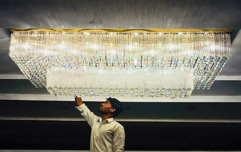 Chandelier Installation by M.K Lighting Technician